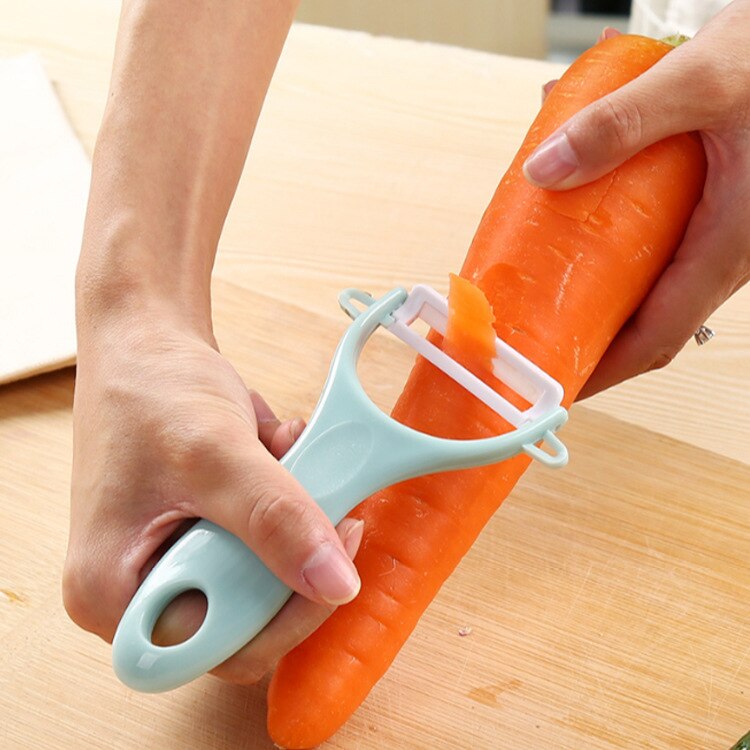 Scraping vegetable peeler