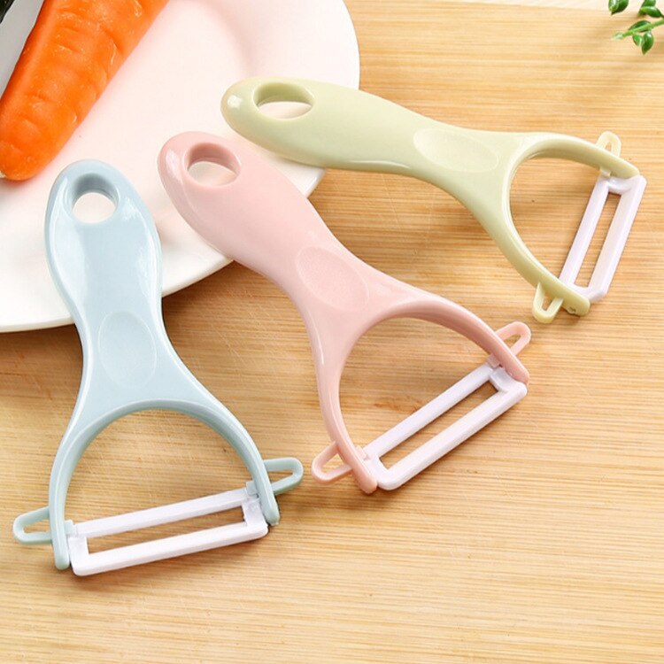 Scraping vegetable peeler