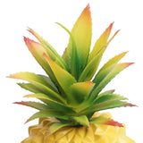 Yellow pineapple plant and green plant office desk decoration