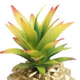 gold pineapple plant and green plant office desk decoration