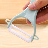 Scraping vegetable peeler