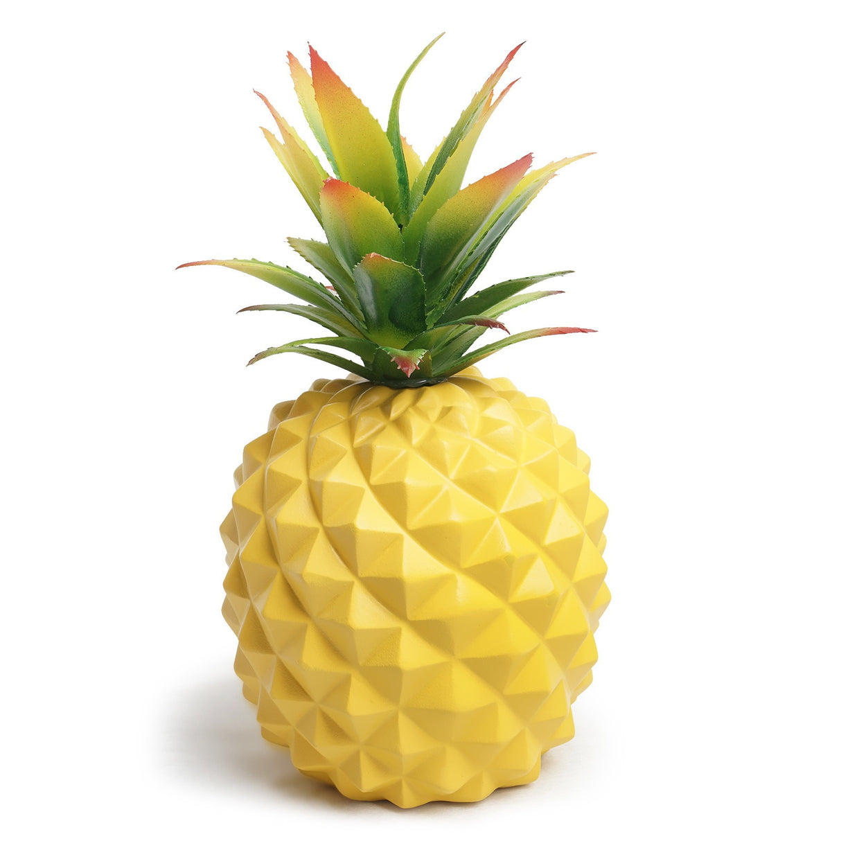 Yellow pineapple plant and green plant office desk decoration